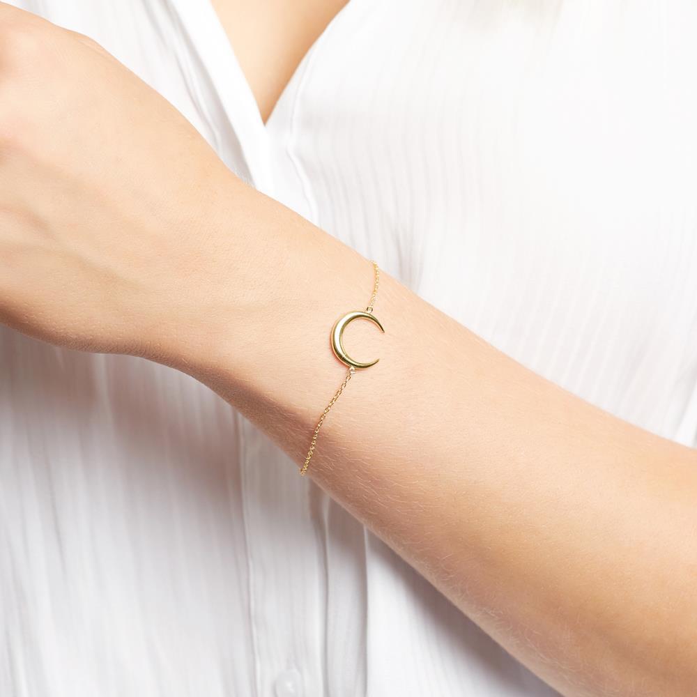 Crescent Moon Bracelet around girls wrist