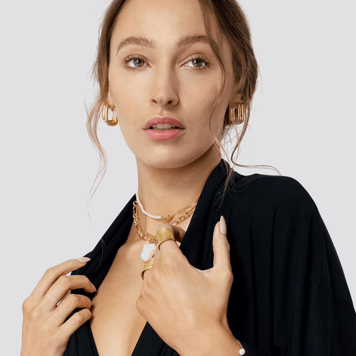 Gold oval huggie earrings