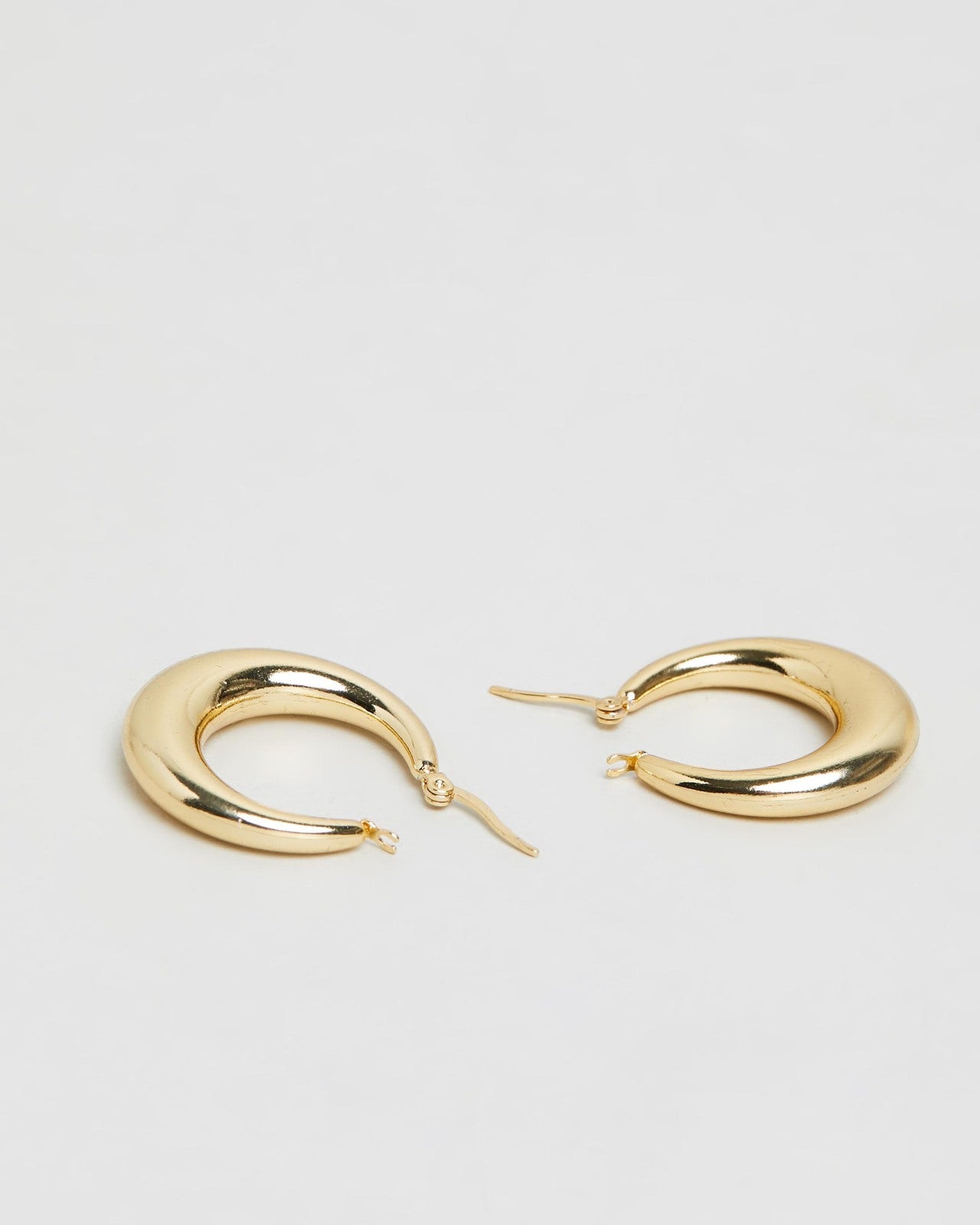 Moon Huggie Earrings