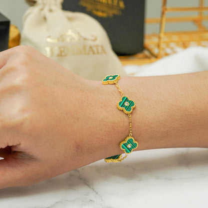 Green Four Leaf Clover Bracelet with Crystals around wrist