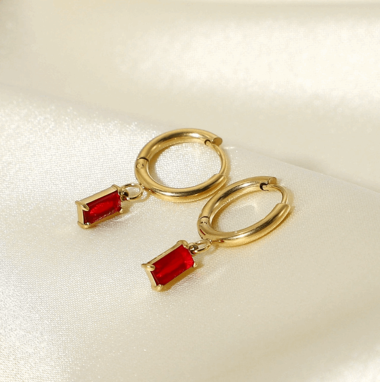 red gemstone drop earrings